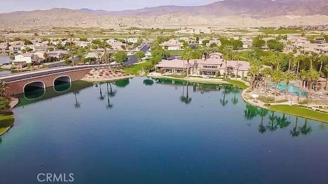 bird's eye view featuring a water and mountain view