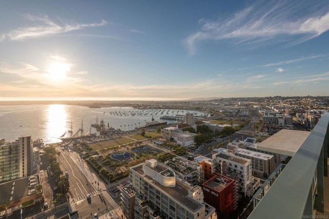 aerial view at dusk with a water view