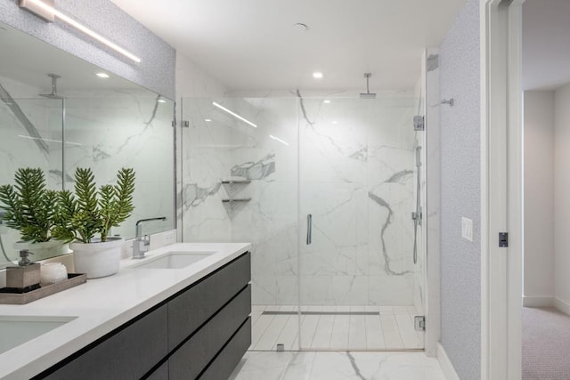 bathroom featuring an enclosed shower, ceiling fan, and vanity