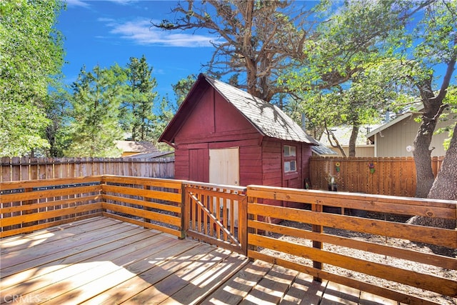 wooden terrace with a storage unit