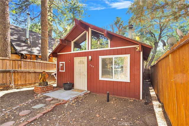 rear view of house with a patio