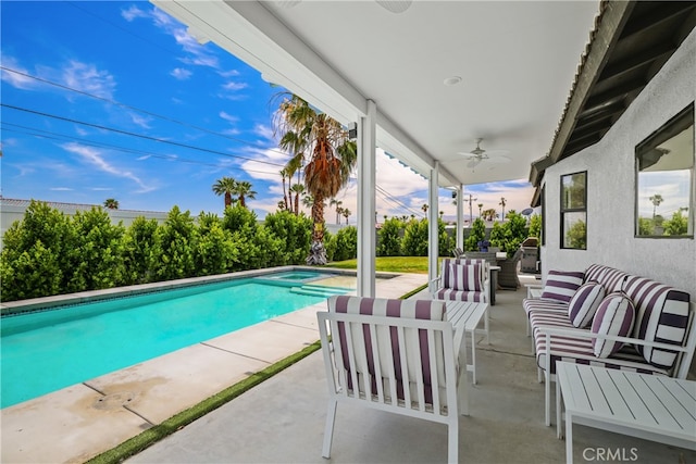 view of swimming pool featuring an outdoor hangout area, ceiling fan, a patio, and a fenced in pool