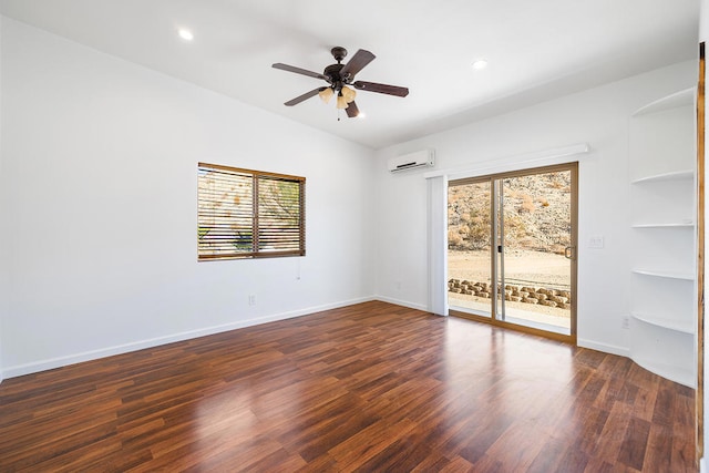 unfurnished room featuring ceiling fan, an AC wall unit, and dark wood-type flooring