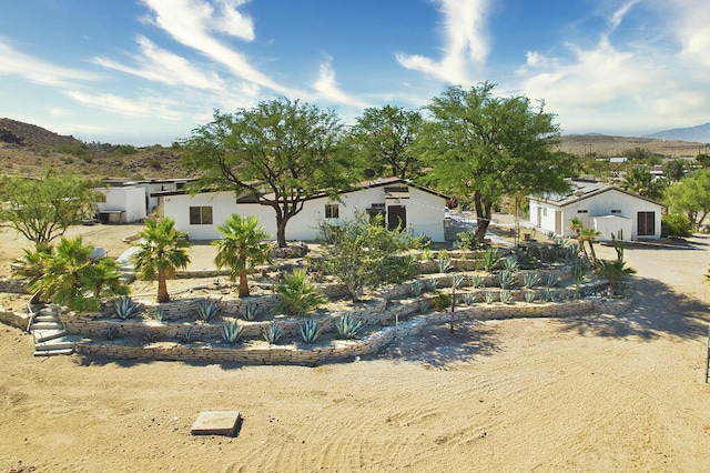 view of front facade with a mountain view