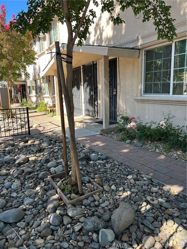 property entrance with a patio