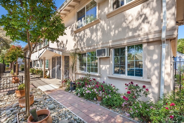 exterior space with an AC wall unit