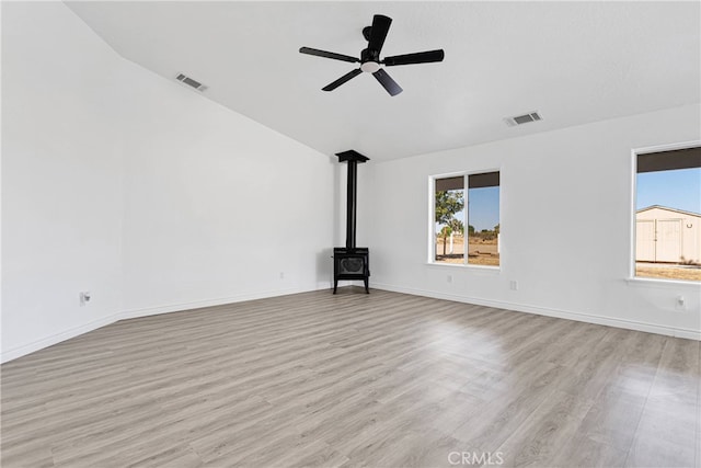 unfurnished living room with light hardwood / wood-style floors, lofted ceiling, and ceiling fan