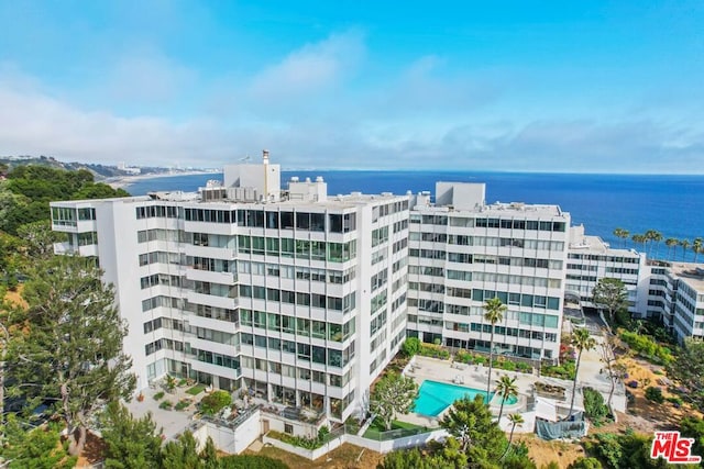 view of property with a water view