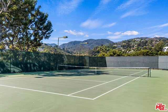 view of sport court featuring a mountain view