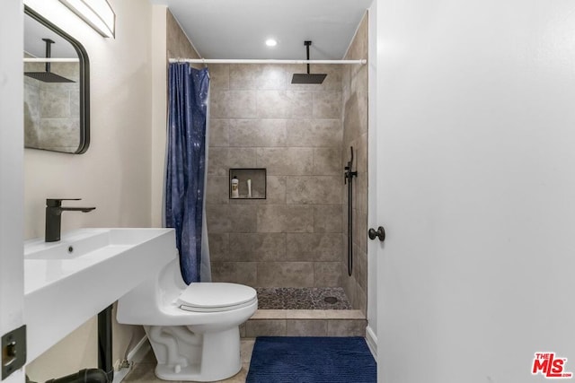 bathroom with toilet and walk in shower