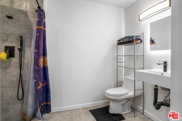 bathroom with toilet, a shower with shower curtain, and tile patterned flooring