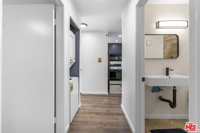 corridor featuring light hardwood / wood-style flooring