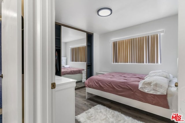 bedroom with wood-type flooring