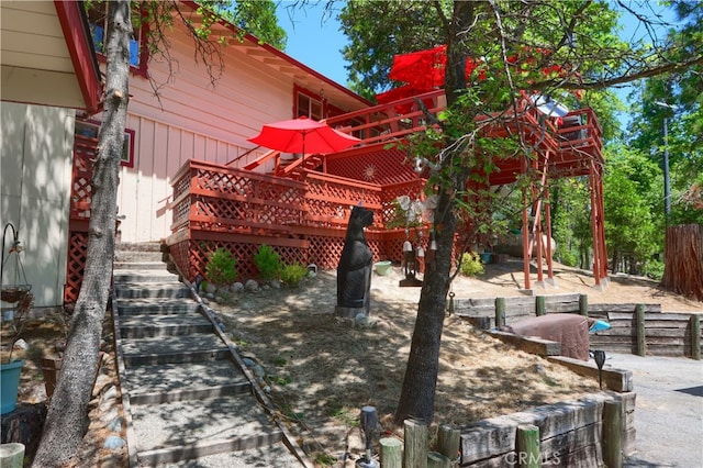 exterior space featuring a wooden deck