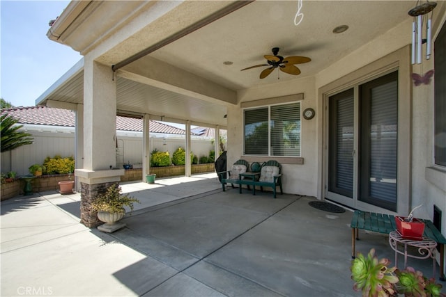 view of patio / terrace featuring ceiling fan