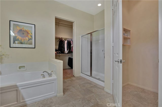 bathroom with independent shower and bath