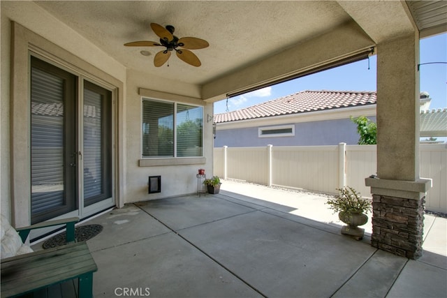 view of patio / terrace featuring ceiling fan