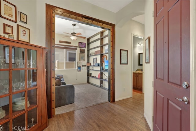 foyer featuring hardwood / wood-style floors and ceiling fan