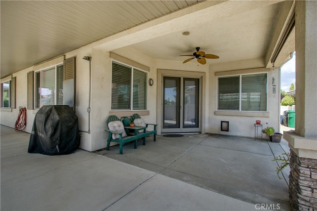 view of patio / terrace featuring area for grilling and ceiling fan