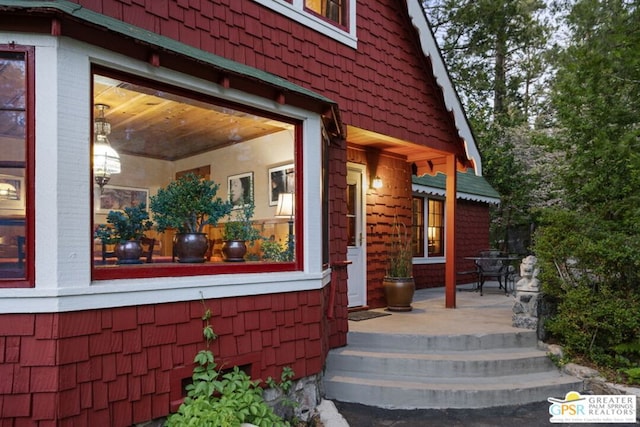 view of side of home featuring a patio