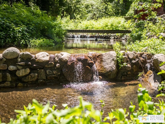 view of yard with a water view