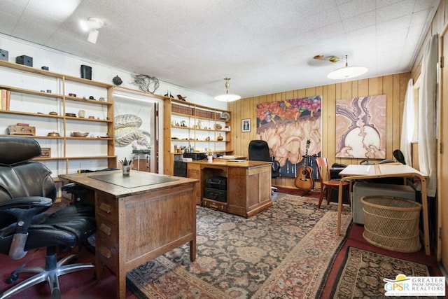 home office with wood walls