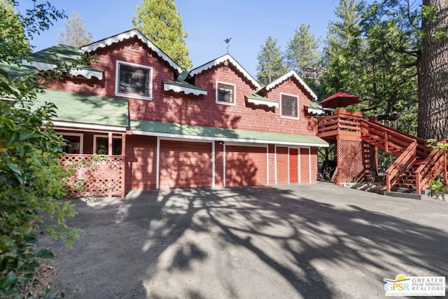 view of front of property with a garage