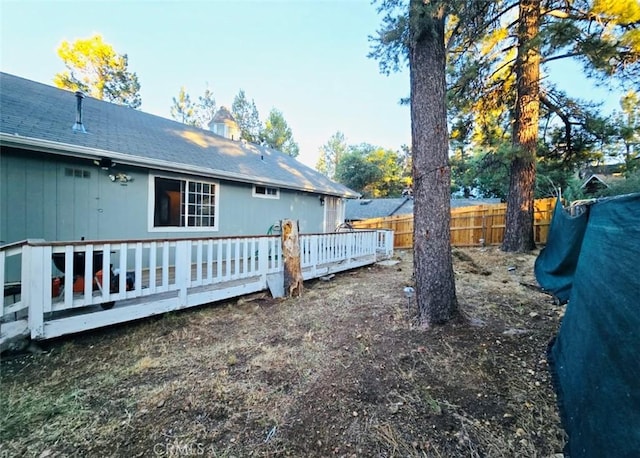 view of yard featuring a deck