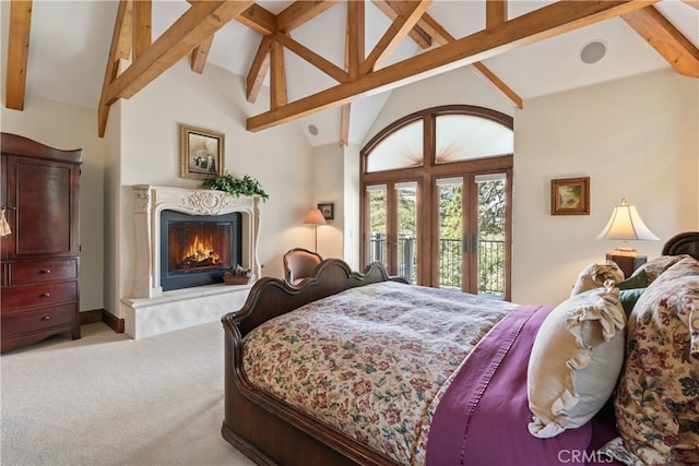 carpeted bedroom with a premium fireplace, access to outside, high vaulted ceiling, and beamed ceiling