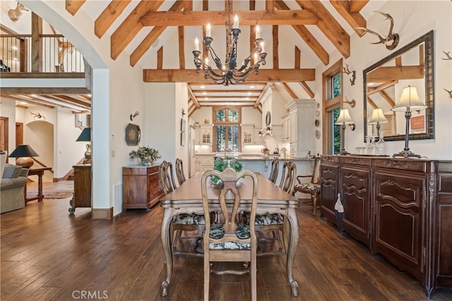 dining room with high vaulted ceiling, beamed ceiling, dark hardwood / wood-style flooring, and a chandelier