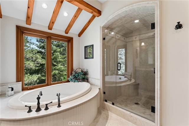 bathroom featuring shower with separate bathtub and lofted ceiling with beams