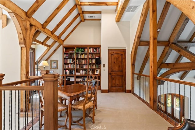28964 Quail Run Ct, Lake Arrowhead, CA 92352 - dining room featuring light carpet and lofted ceiling