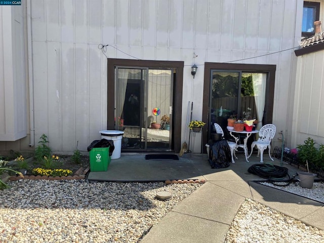 doorway to property with a patio area