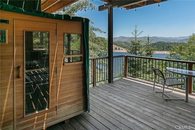 wooden terrace with a mountain view