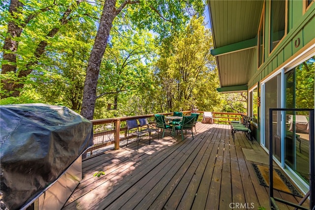 deck featuring a grill