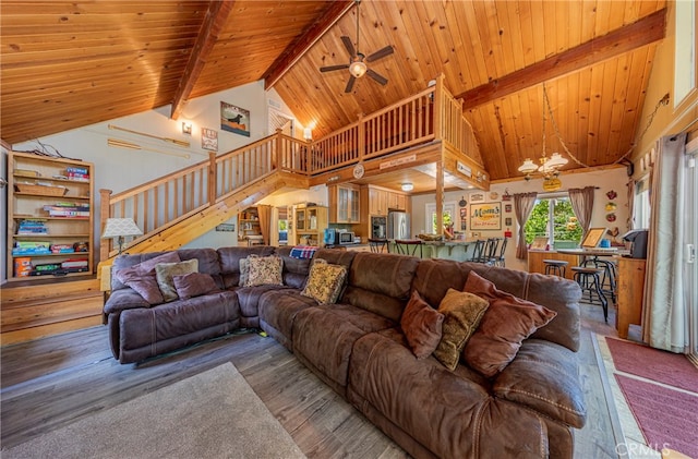 living room featuring hardwood / wood-style flooring, beamed ceiling, wooden ceiling, high vaulted ceiling, and ceiling fan