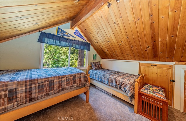 bedroom featuring lofted ceiling with beams, carpet flooring, and wooden ceiling