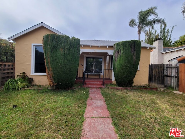 view of front of house with a front yard