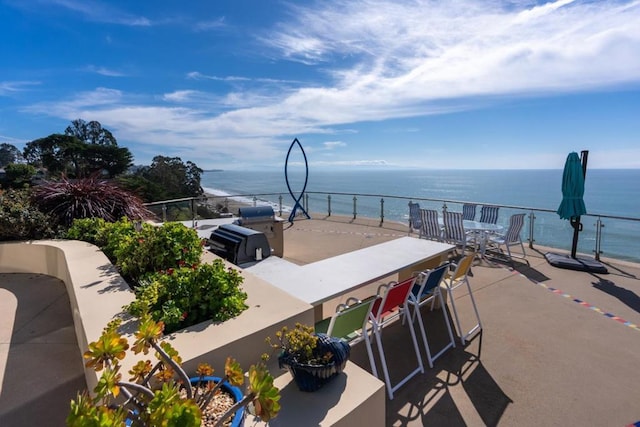 view of patio / terrace featuring a water view