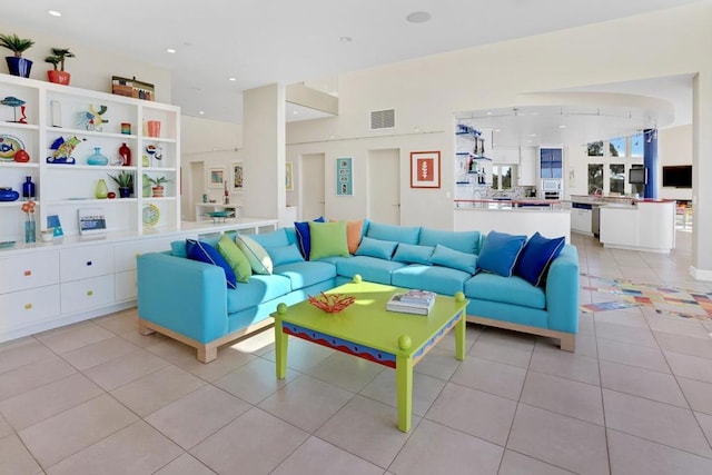 living room featuring light tile patterned floors