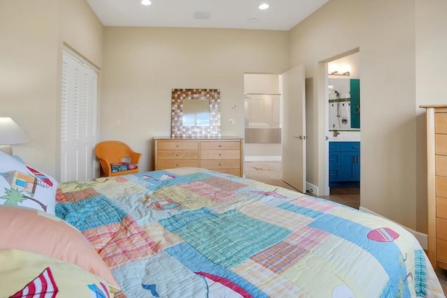 bedroom featuring ensuite bathroom