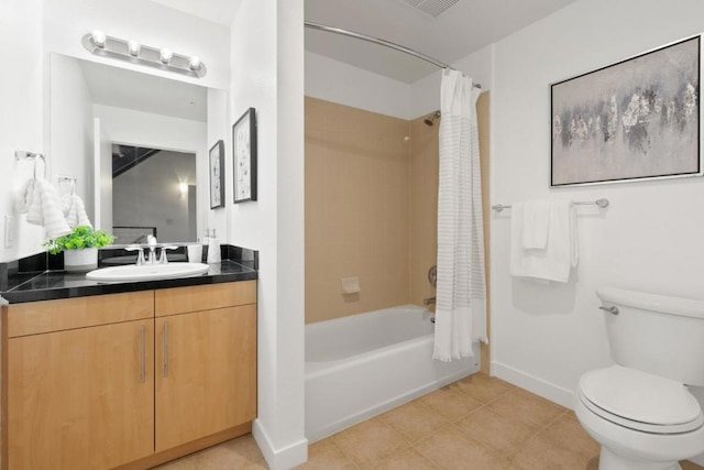 full bathroom featuring tile patterned floors, vanity, shower / bath combination with curtain, and toilet