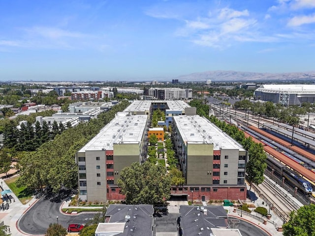 birds eye view of property featuring a mountain view