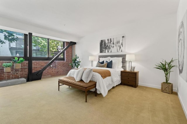 bedroom featuring access to outside and light colored carpet