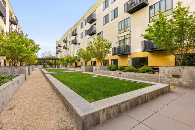 view of community with a lawn