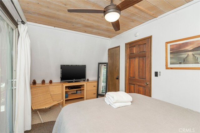 bedroom with carpet flooring, wood ceiling, ceiling fan, lofted ceiling, and ornamental molding