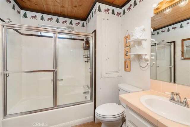 full bathroom with vanity, toilet, wooden ceiling, and enclosed tub / shower combo