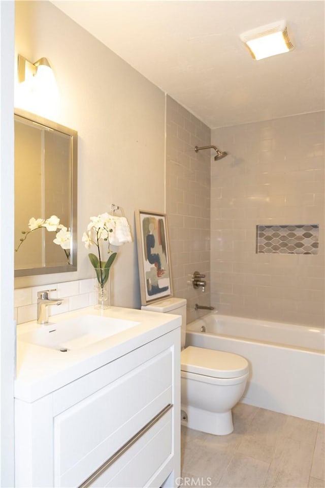 6829 Corintia St, Carlsbad, CA 92009 - full bathroom with vanity, toilet,  shower combination, and tile patterned floors