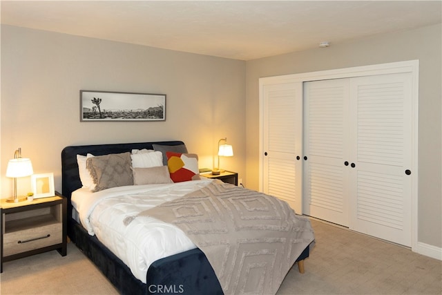 carpeted bedroom with a closet