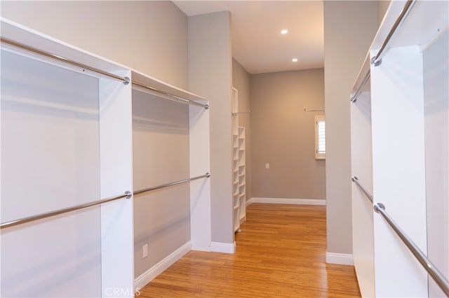 walk in closet featuring light wood-type flooring